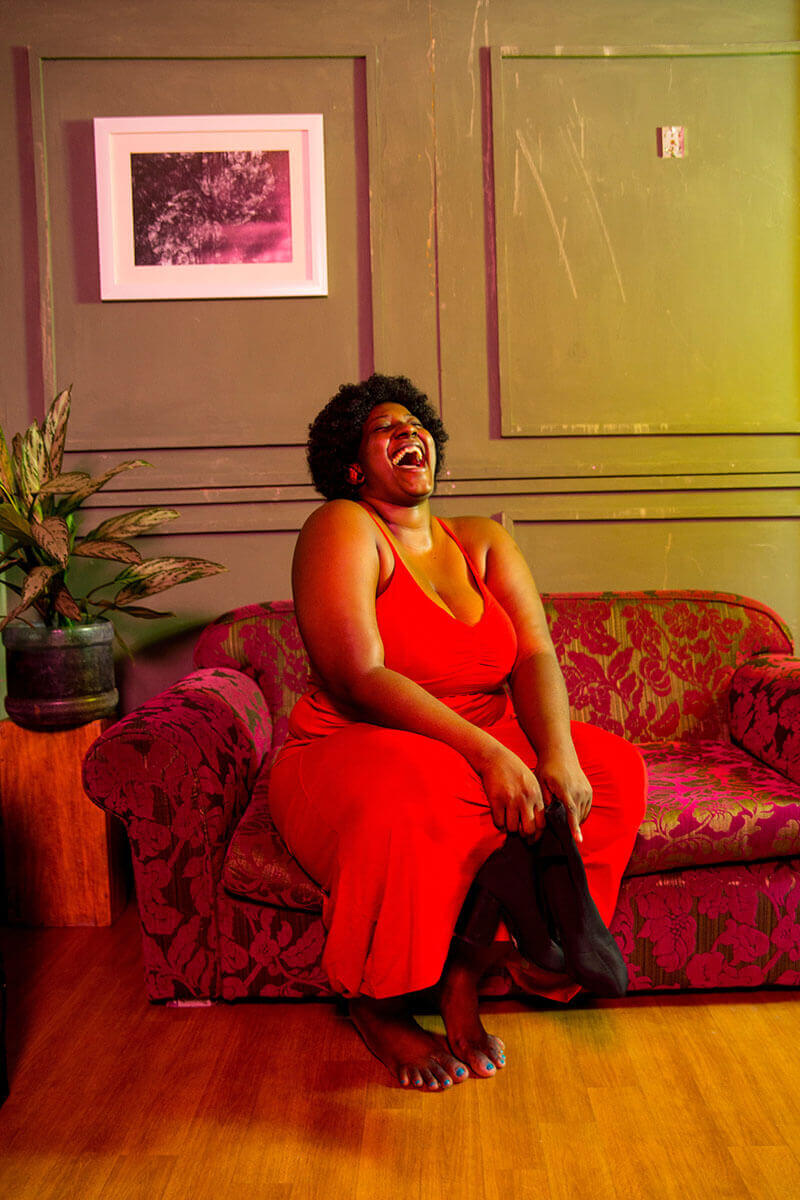 Woman in Red Dress Laughing